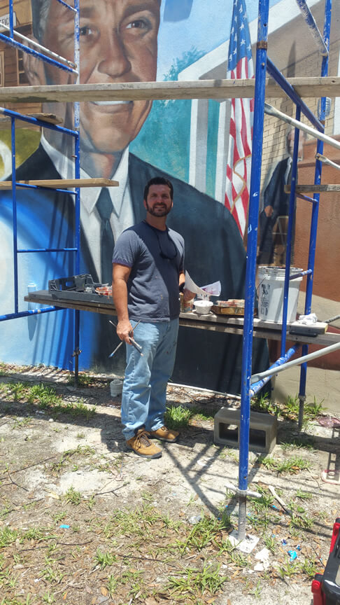 A vibrant outdoor mural in Lake Placid, Florida, painted by local artist Keith Goodson &mdash; part of the town's celebrated collection of more than 50 hand-painted murals